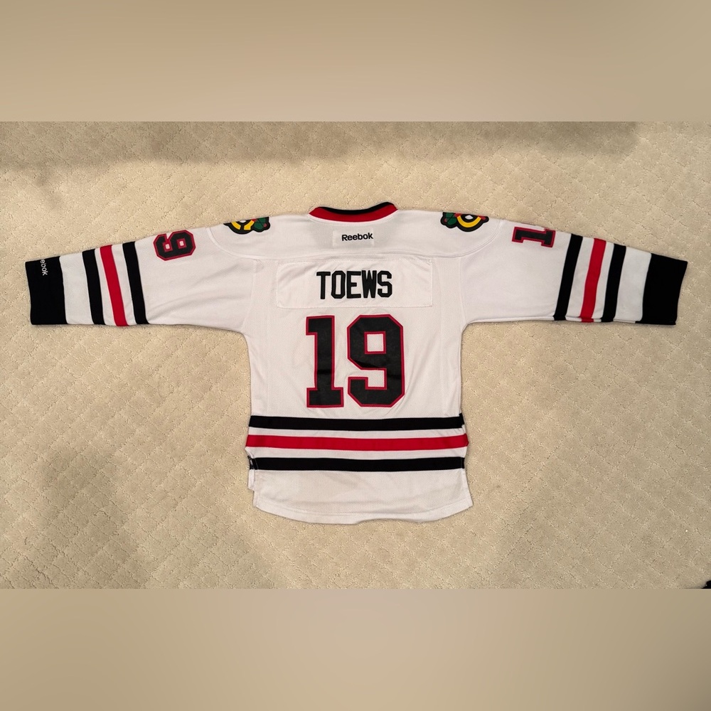 Reebok Chicago Blackhawks Toews White Jersey with Red and Black Stripes